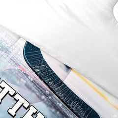 Folded presentation of ice hockey bedding displaying sharp graphic clarity in indigo violet and lilac tones