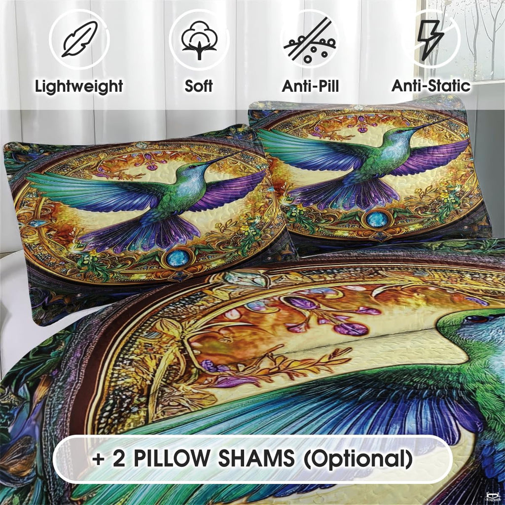 Close view of coordinated pillows with jeweled hummingbird medallion artwork