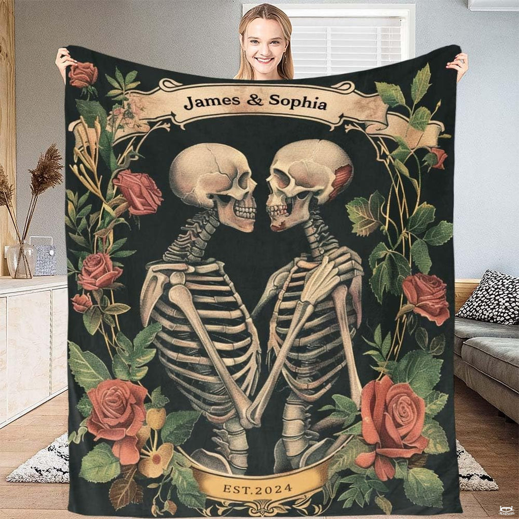 Gothic skeleton couple roses throw blanket featuring two embracing skeletons and vintage floral banners