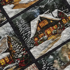 Close-up view of holiday bedding showcasing snowman illustration, frost slate blue, and pine wreath