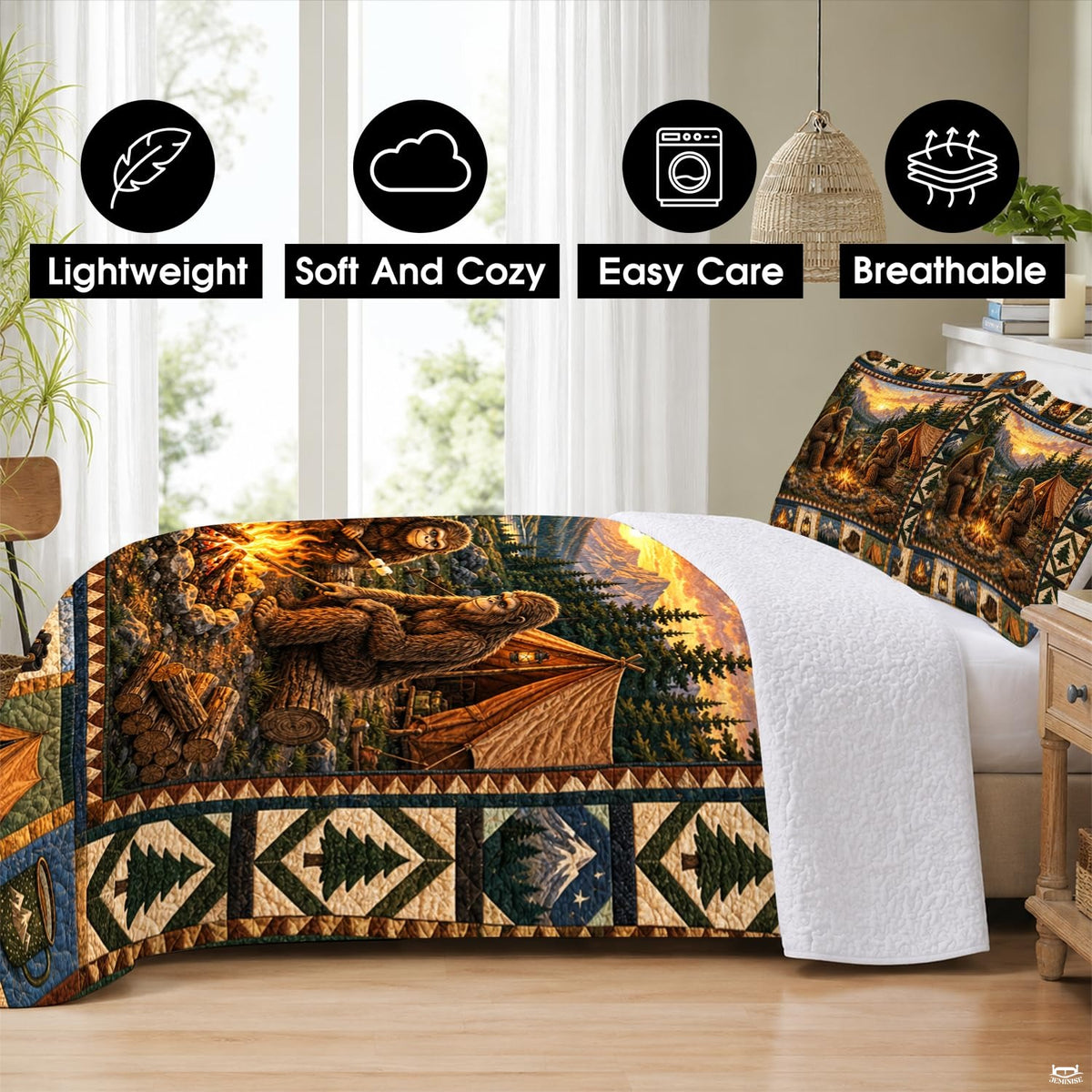 Matching pillow shams displaying a creature family campfire scene on an alpine bedding set