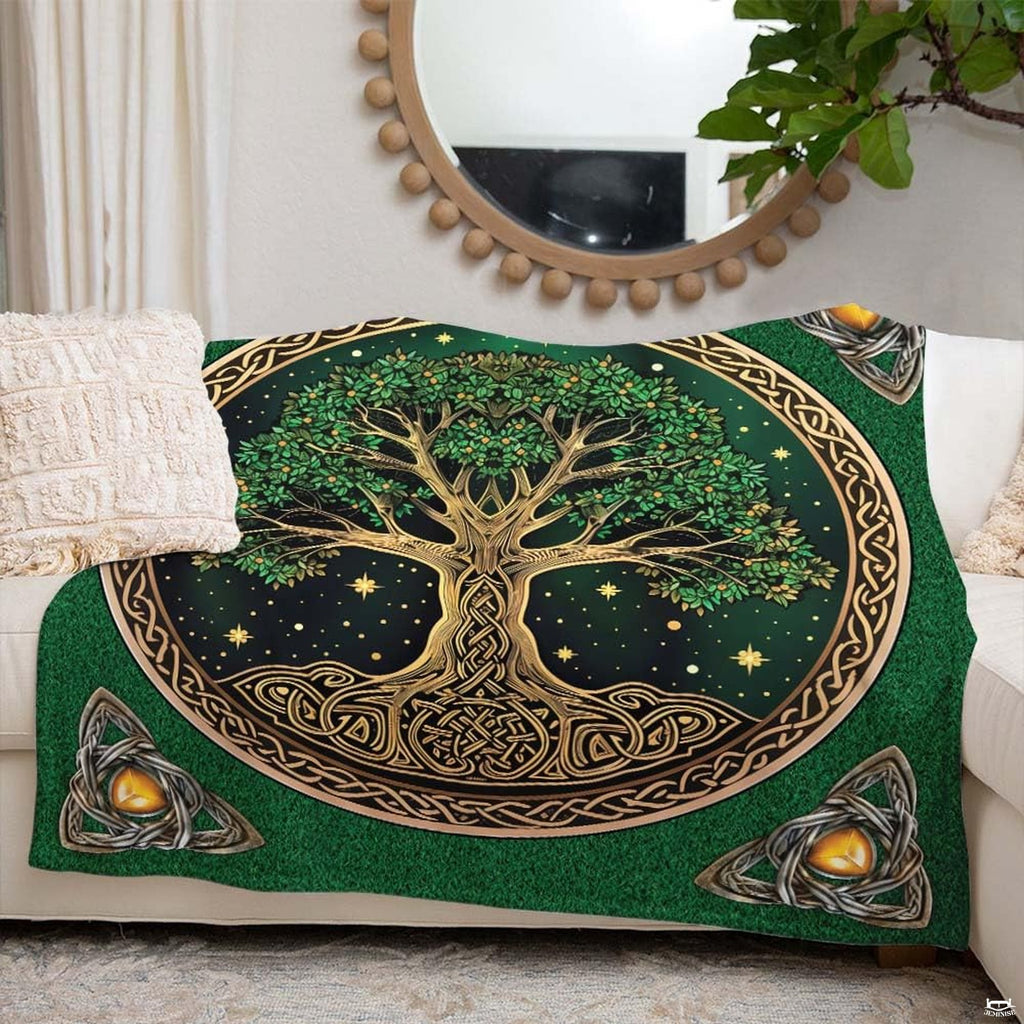 Overhead perspective of the gold medallion and tree of life throw knitting pattern motif.