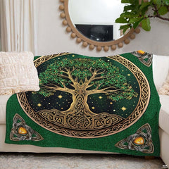 Overhead perspective of the gold medallion and tree of life throw knitting pattern motif.