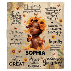 Close-up of radiant sunflower headdress, monarch butterflies, and portrait artwork.
