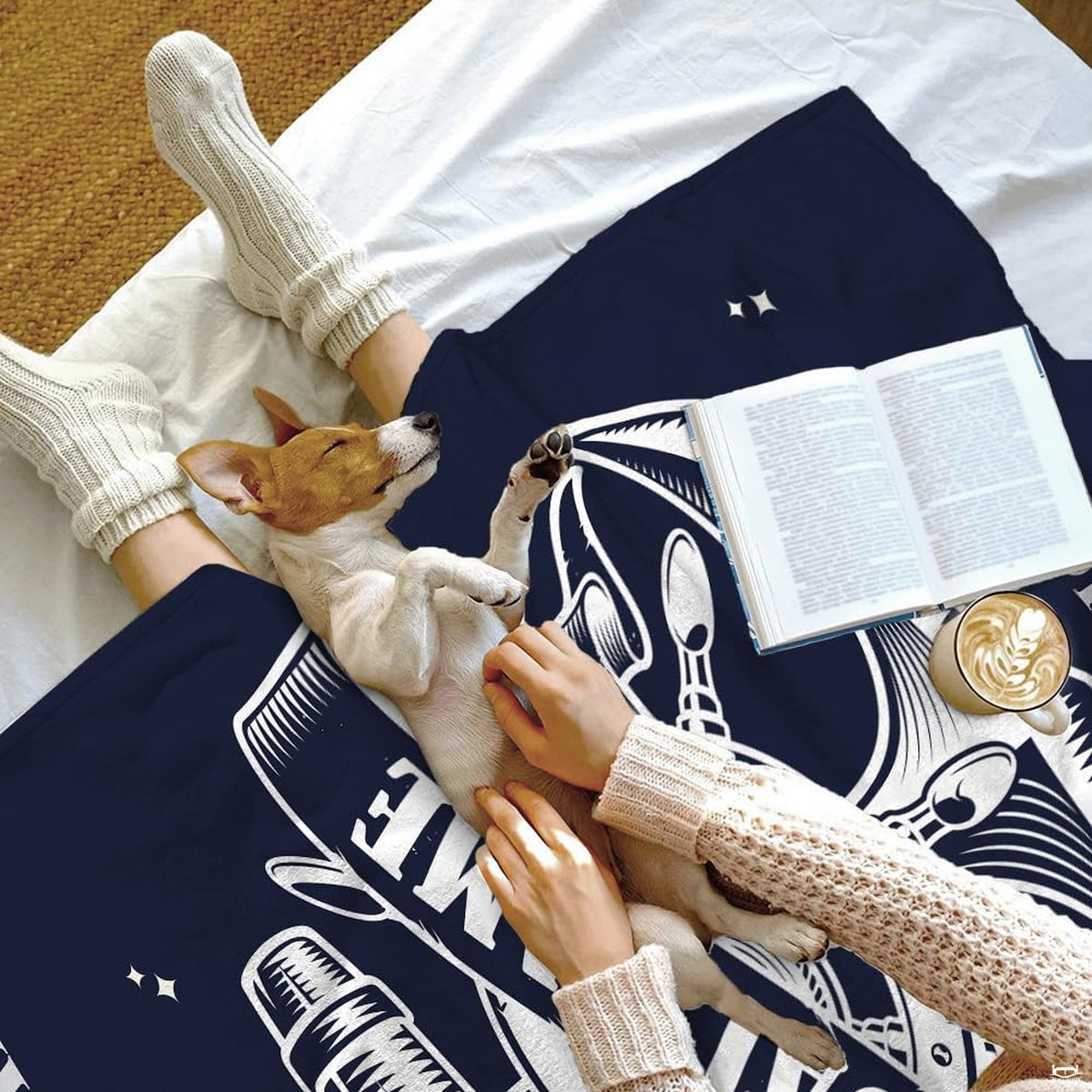 Detailed linework of maritime helm, star accents, and banner on navy bedding.