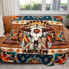 Full flat lay of the Southwestern bull skull tribal feather blanket composition.