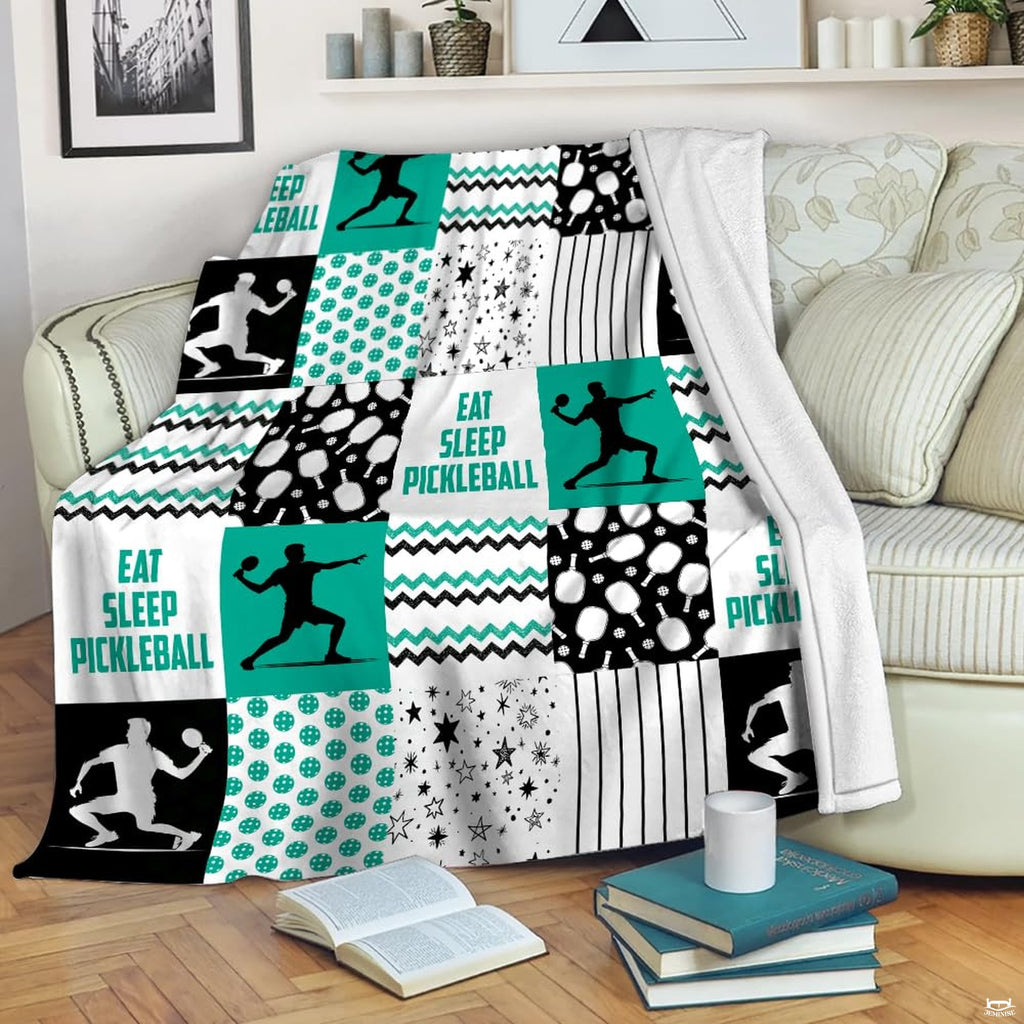 Pickleball patchwork pattern with player silhouettes and teal chevrons, view 1.