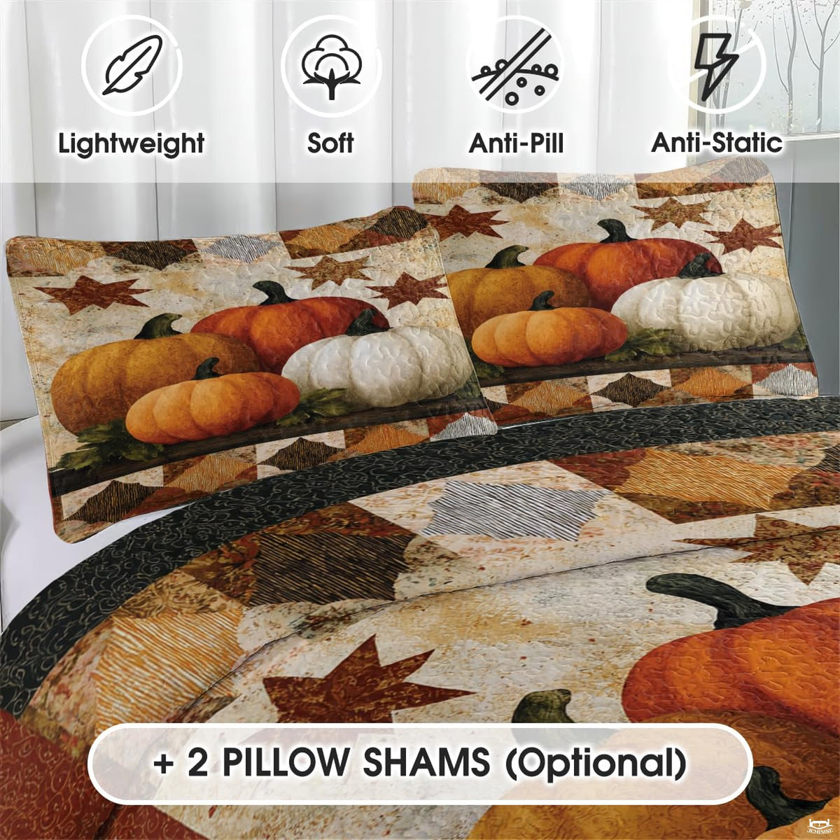 Close-up detail of autumn leaf bedding displaying stylized pumpkin vines, maple leaves, and wine sienna graphic accents.