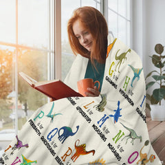 Prehistoric thematic accent letters with cute cartoon dinosaurs in earthy greens and oranges on this playful bedding set.