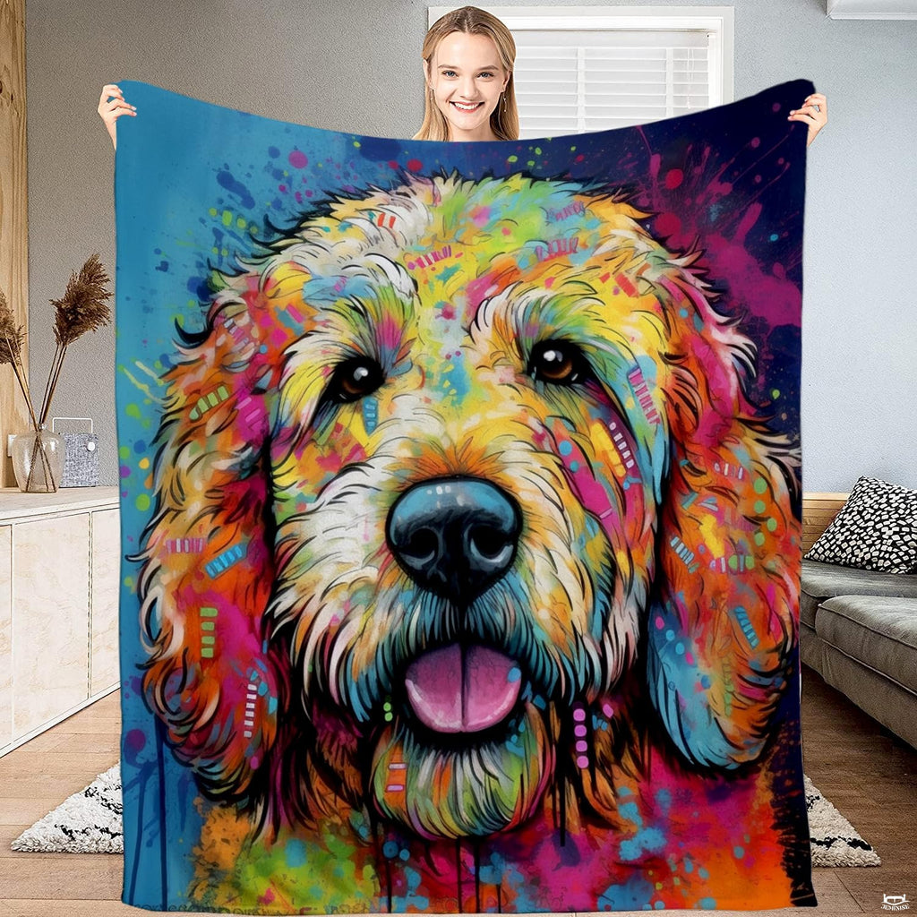 Colorful watercolor splash doodle dog art blanket held upright by model