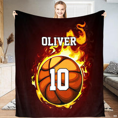 Basketball bedroom decorating ideas featuring intense flame graphics on dark bedding.