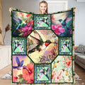 Botanical birds bedding featuring hummingbird and tropical floral collage panels in vibrant emerald and coral.