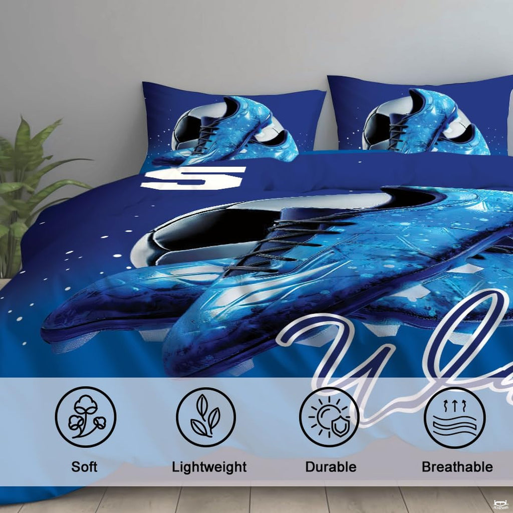 Overhead view of blue soccer cleats bedding arranged neatly across an athletic youth bedroom mattress
