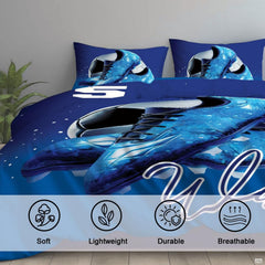 Overhead view of blue soccer cleats bedding arranged neatly across an athletic youth bedroom mattress