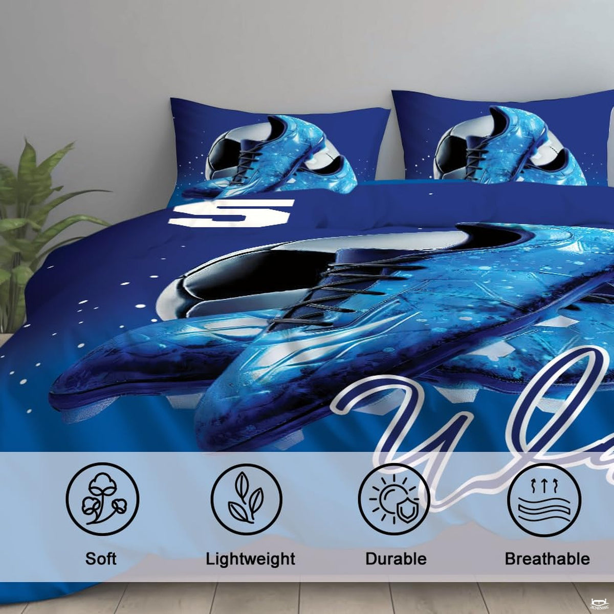 Overhead view of blue soccer cleats bedding arranged neatly across an athletic youth bedroom mattress