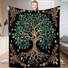 Golden spiral Tree of Life teal foliage throw blanket held open by woman
