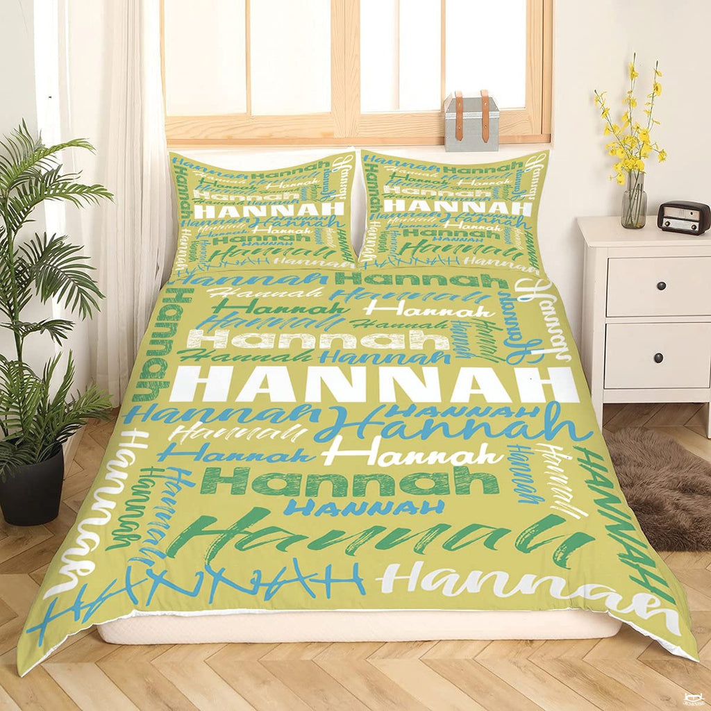 Yellow and green typography bedding displaying vibrant word collage artwork in bedroom setting
