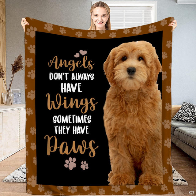 Golden doodle puppy portrait with decorative canine typography and mocha patterned border on a throw blanket