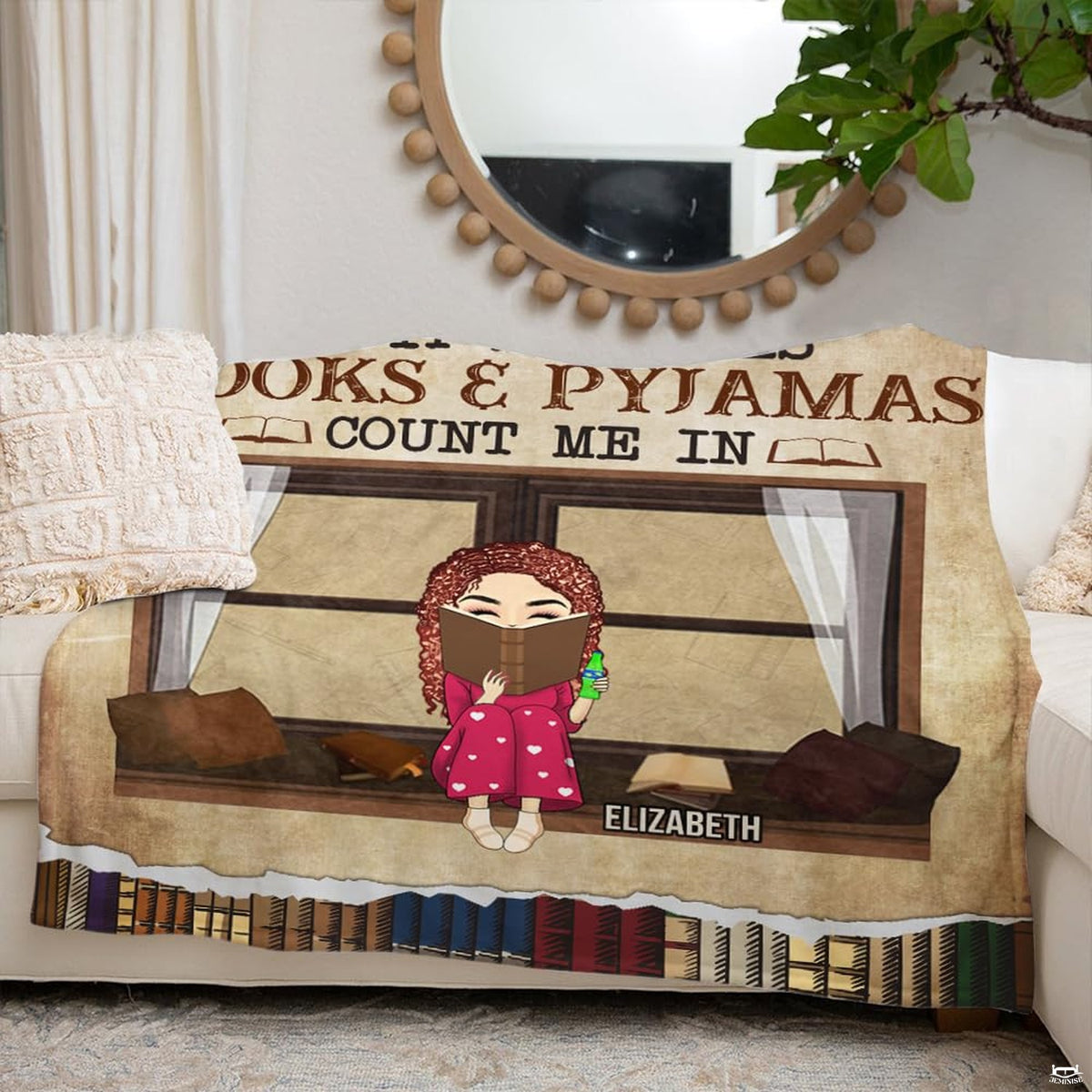 Cozy reading lifestyle scene displaying book lover throw blanket draped in a library corner.