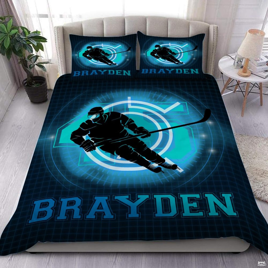 Neon cyan flaming ice hockey sports bedding set featuring dynamic hockey skater graphics and blazing flame trails