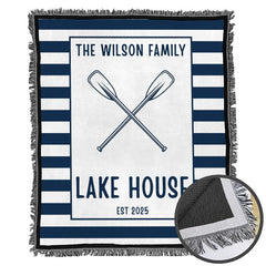 Lakeside bedroom styled with cabin bedding sets and crossed canoe motifs.