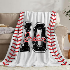 Baseball jersey number red lacing throw blanket held open showing bold athletic graphic artwork