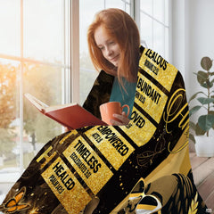 Home interior setting featuring the inspiring female portrait throw blanket.