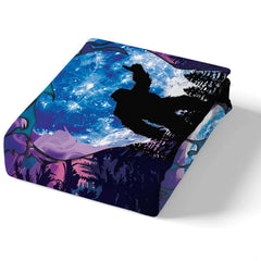 Close-up view of Bigfoot bedding showcasing humorous solitary creature artwork and alpine blue tones