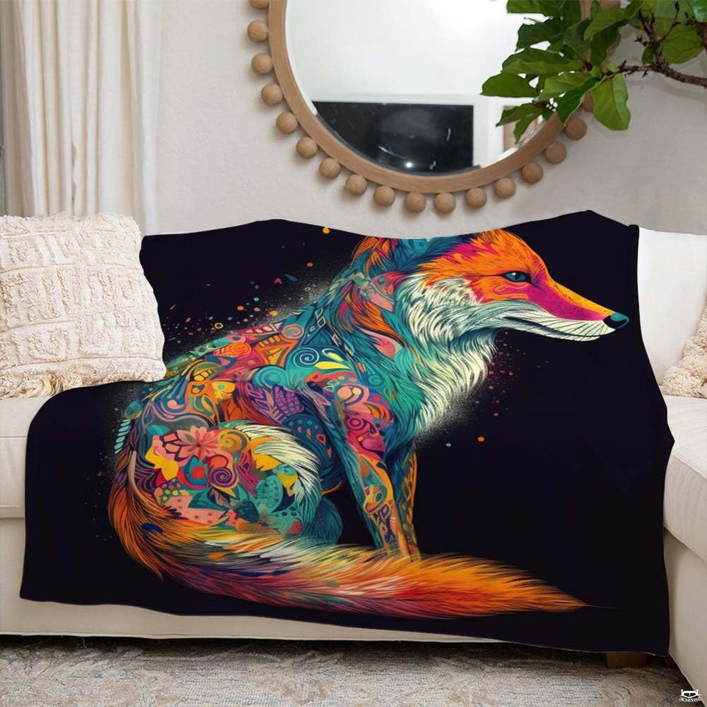 Psychedelic paisley fox throw blanket arranged neatly over modern gray bedroom couch