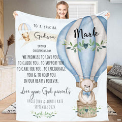 Teddy bear bedding featuring a watercolor bear riding a striped hot air balloon with olive sprigs.