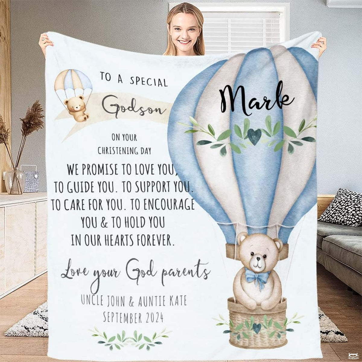 Teddy bear bedding featuring a watercolor bear riding a striped hot air balloon with olive sprigs.