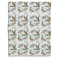 Mallard duck bedding set showcasing standing and flying waterfowl pattern with botanical greenery sprigs on white ground