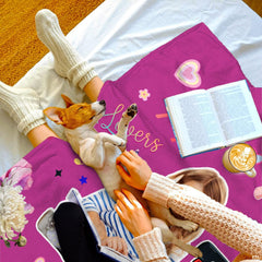 Close-up view of the pink acoustic guitar, colorful book stack, butterflies, and music notes.