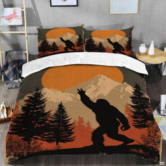 Top angle perspective of bigfoot silhouette bedding showing detailed striped sunset rings and pine tree accents.