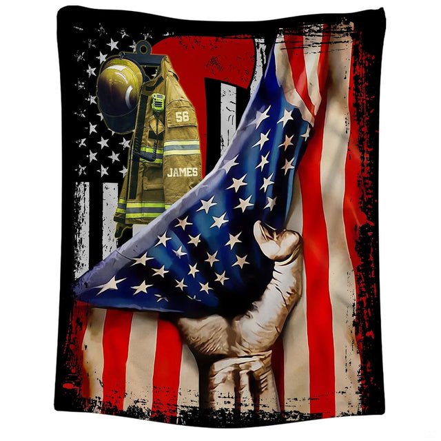 American flag bed cover display showcasing firefighter helmet graphic and grunge splatters.