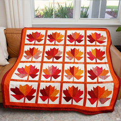 Contrasting layered border framing in dark rust red and pumpkin orange surrounding foliage panels