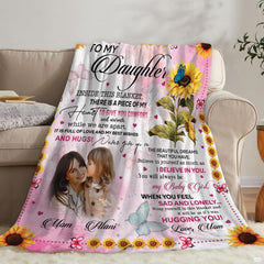Sunflower daughter throw blanket view 6 highlighting sunflower blooms, butterflies, and pastel pink background