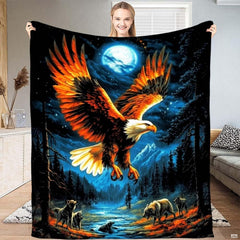 Soaring bald eagle under full moon over wolves and mountain river throw blanket