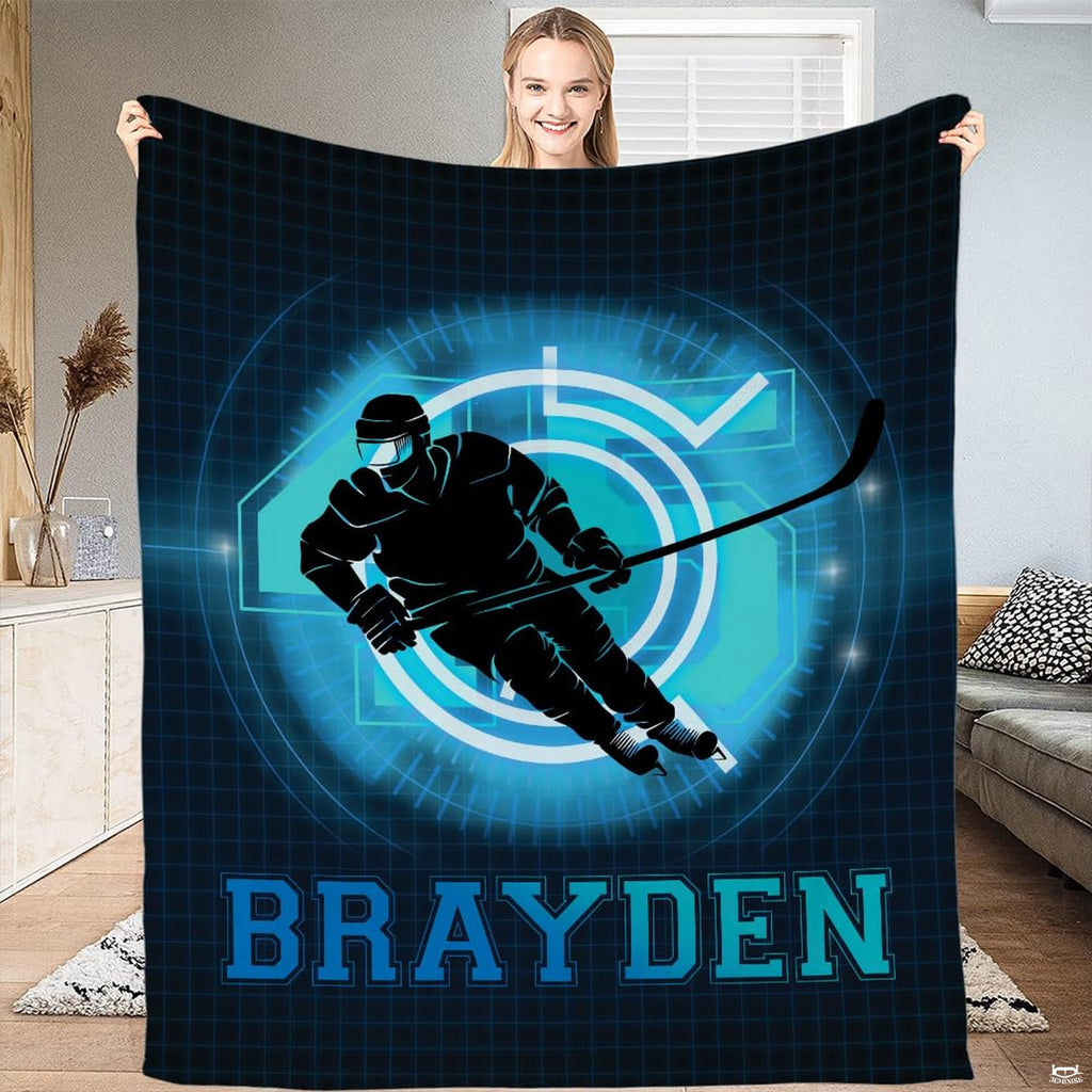 Full flat view of ice hockey skater throw blanket showing neon digital grid and varsity text.