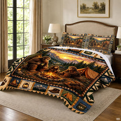 Close-up of the glowing stone fire pit, lanterns, and mountain valley on an outdoor camping bedding set