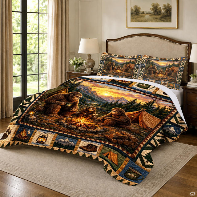 Close-up of the glowing stone fire pit, lanterns, and mountain valley on an outdoor camping bedding set