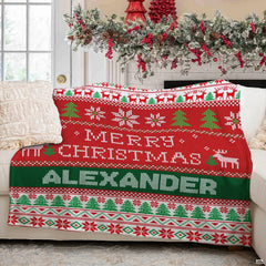 Festive holiday sweater graphic blanket spread flat on floor area