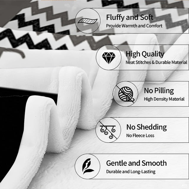 Detailed view of dog paw bedspread pattern with bones, hearts, and chevron stripes.