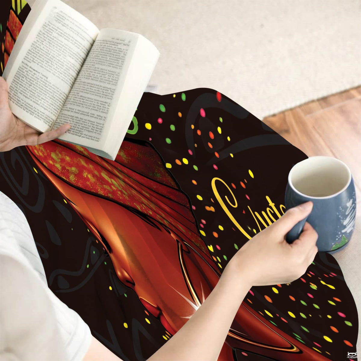Living room sofa styled with the Afrocentric woman empowerment throw blanket