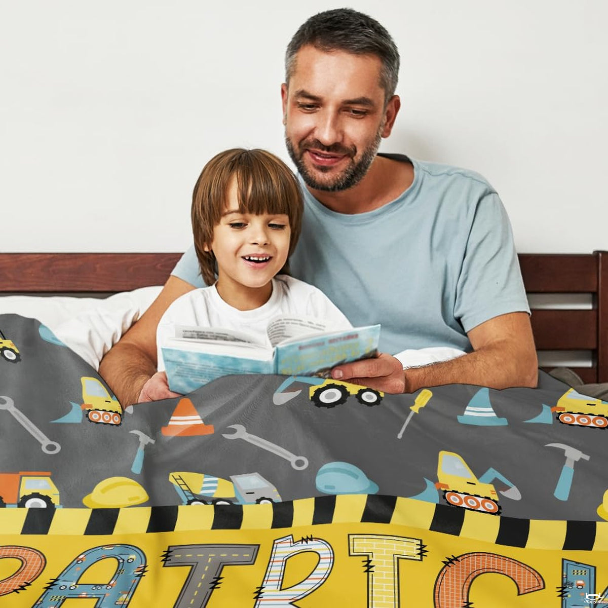 Construction dump trucks, excavators, and yellow caution stripe banner on grey background, view 9.