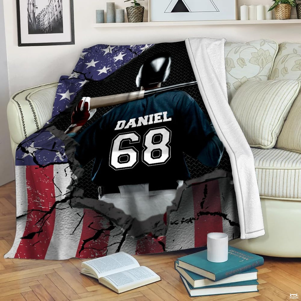 Detailed view of batter in dark navy jersey with american flag baseball bat motif on bedding.