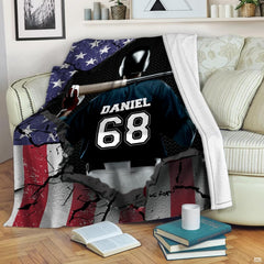 Detailed view of batter in dark navy jersey with american flag baseball bat motif on bedding.