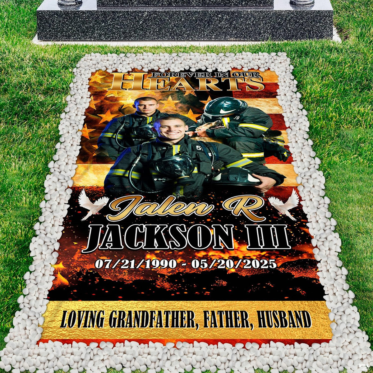 Firefighter memorial grave blanket installed over lawn grave site bordered by river pebbles