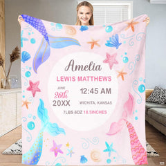 Nursery room styling with pastel watercolor mermaid blanket