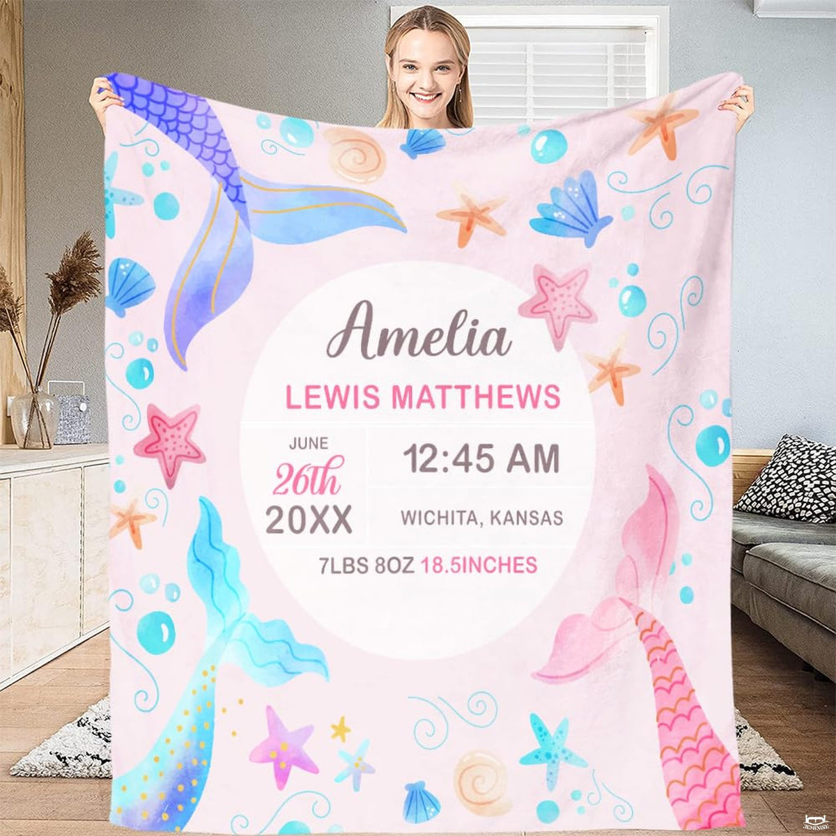 Nursery room styling with pastel watercolor mermaid blanket